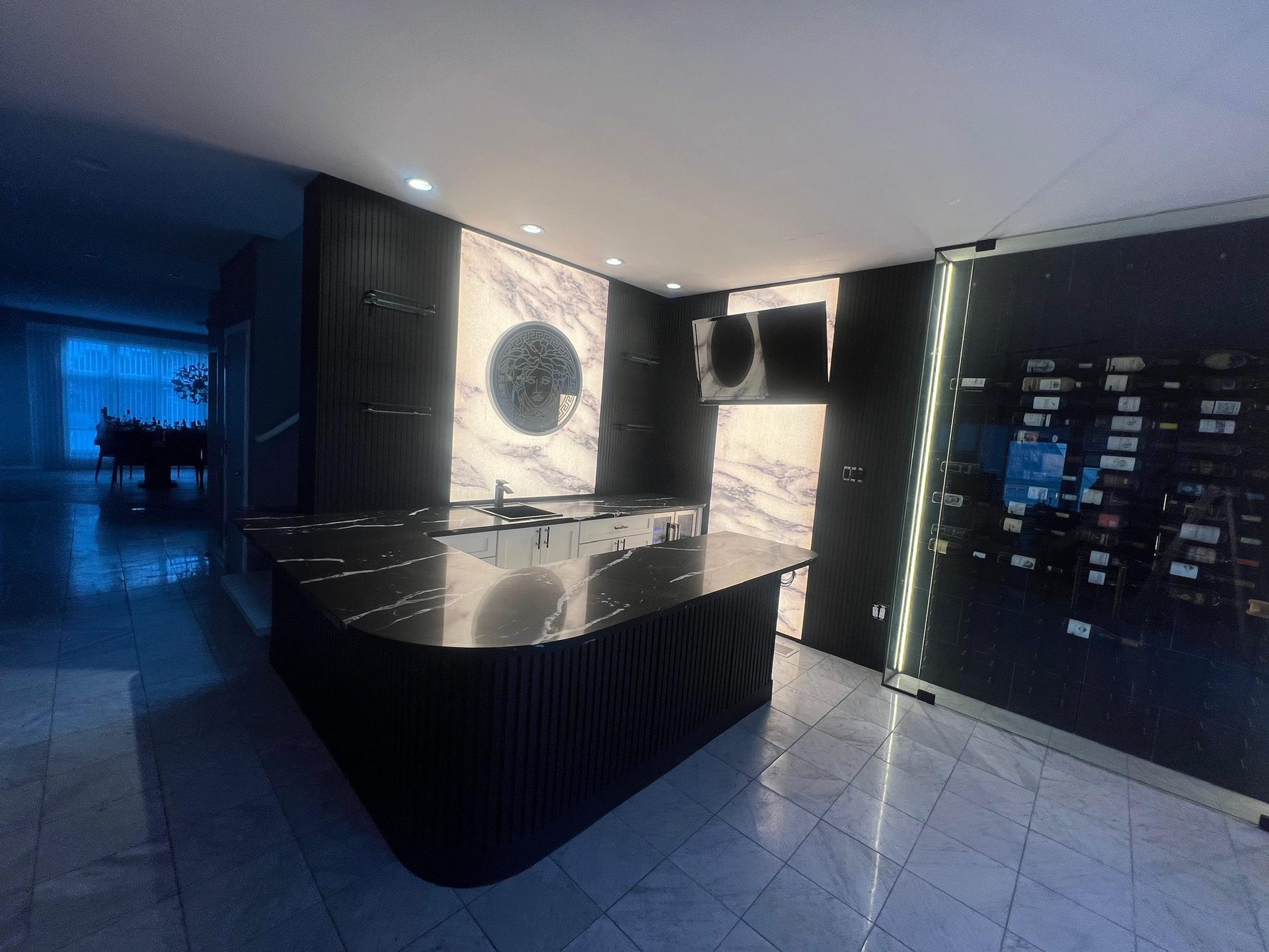 Custom kitchen and bar remodel with marble surfaces