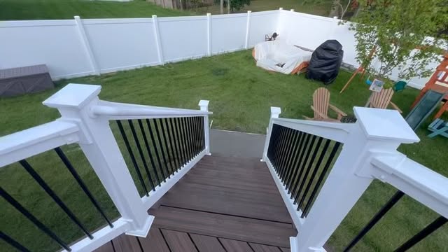 Finished deck with white and black railings