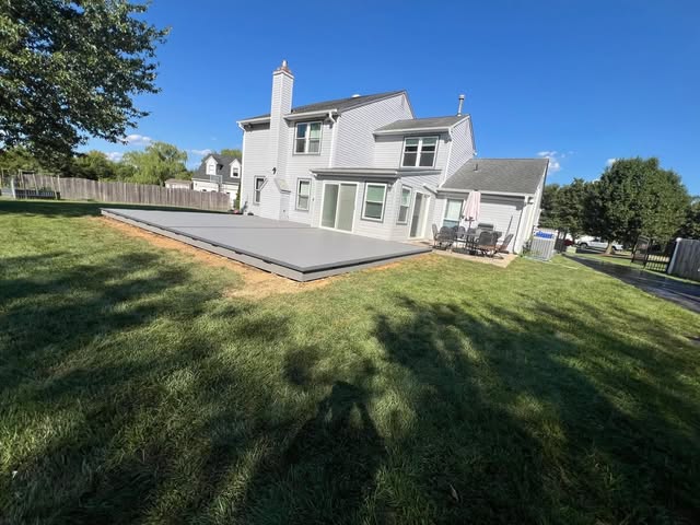 Large concrete backyard patio